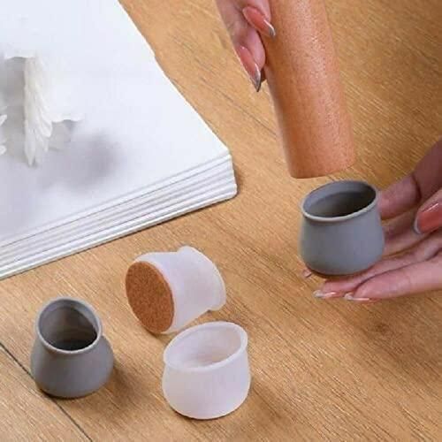Rubber chair leg caps fitted to round wooden legs beside assorted caps